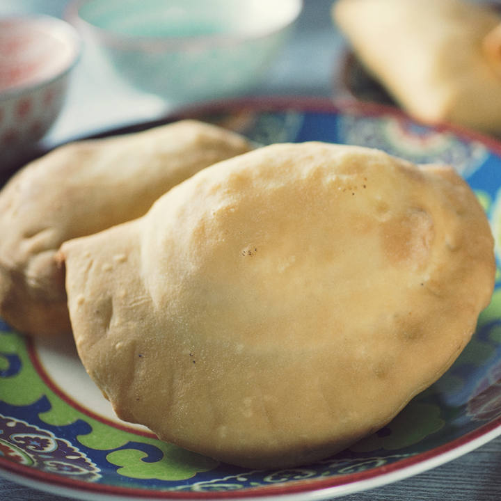 I Panzerotti Pomodoro, Mozzarella E Olive  dei Girarrosti Santa Rita